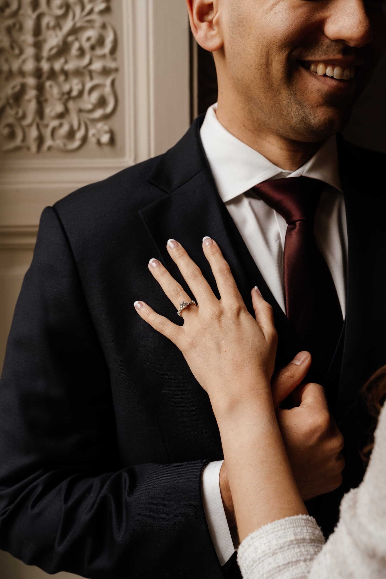 A couple close together during an engagement shoot