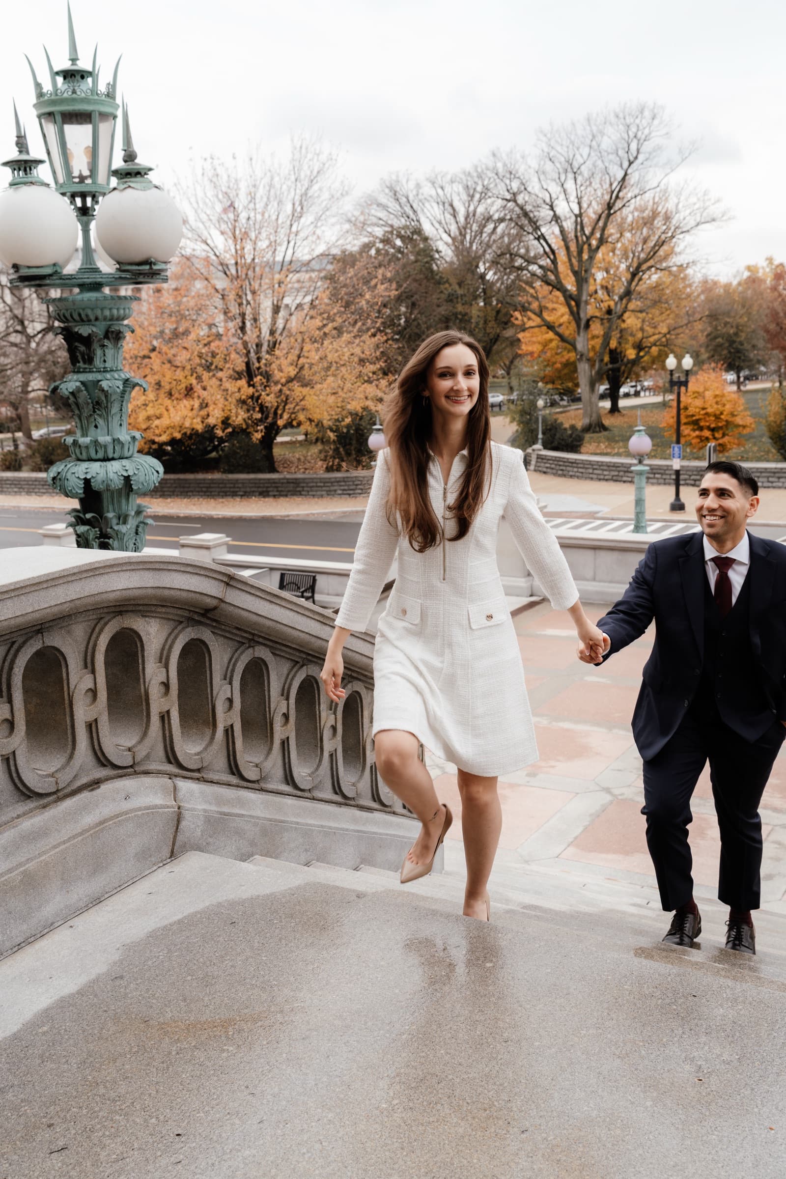 A couple walking together during an engagement session
