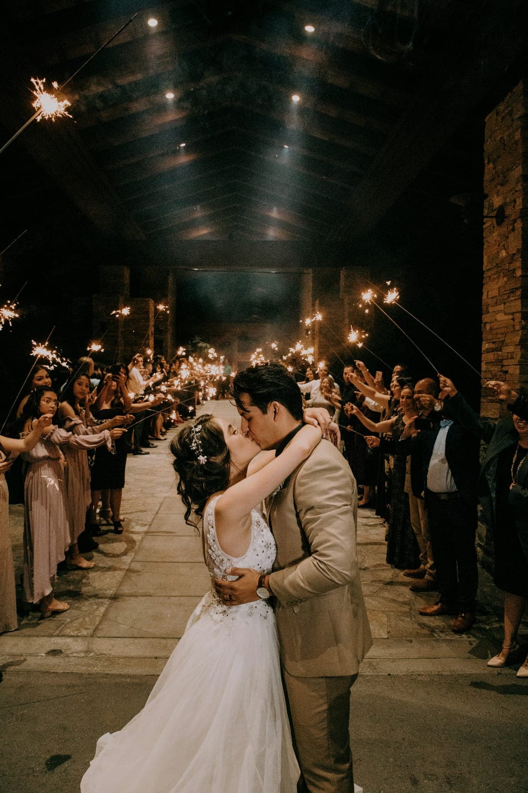 A bride and groom photographed together outdoors